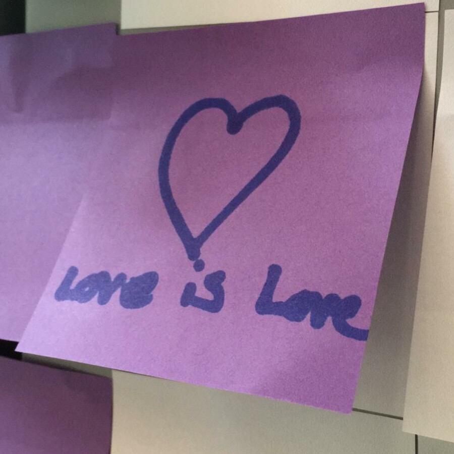 A post-it on our Pride display saying 'Love is Love'